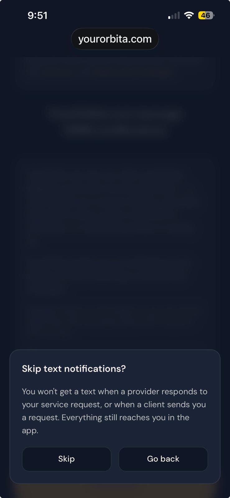 The YourOrbita in-app confirmation dialog, shown in English to all users, appearing when continuing without opting in from a Spanish-language account, offering a choice to skip text messages or go back to the consent screen.