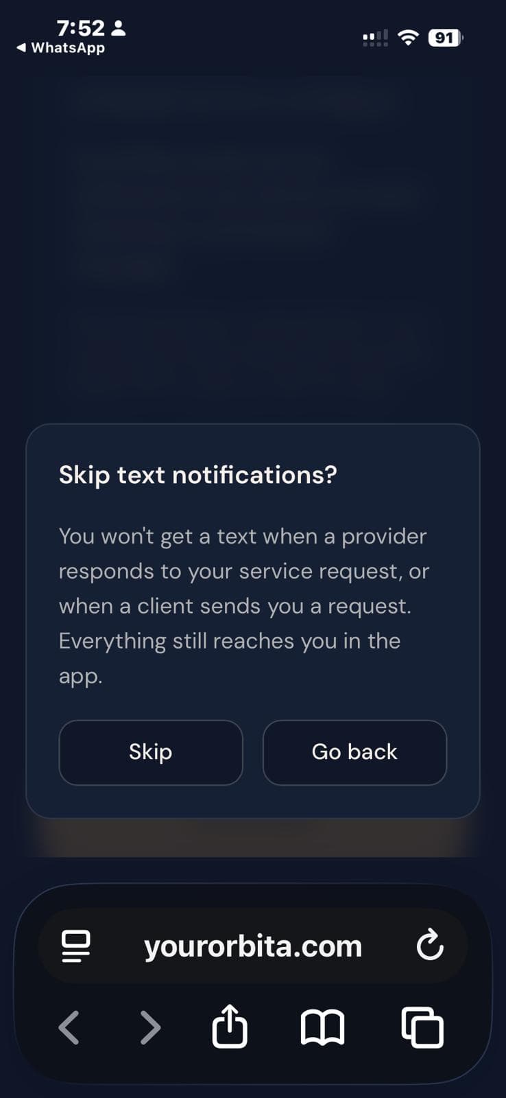 The YourOrbita in-app confirmation dialog shown when continuing without opting in, offering a choice to skip text messages or go back.
